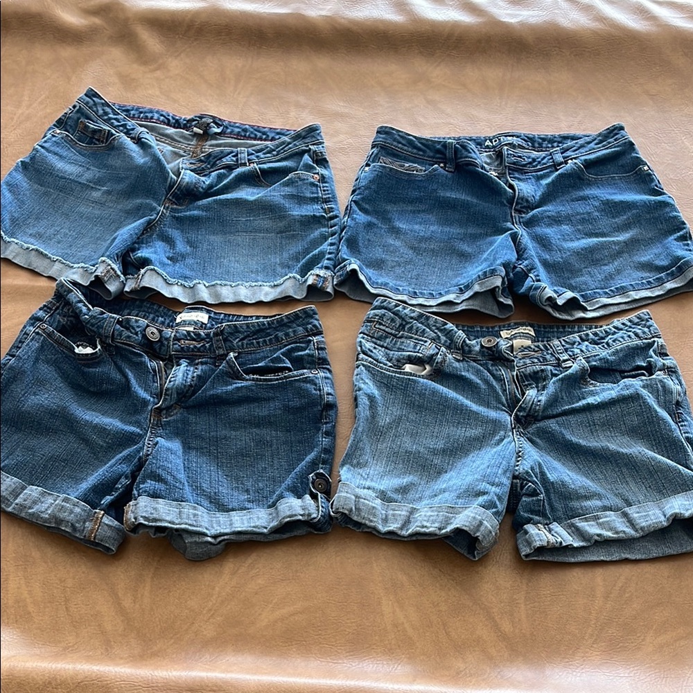 Women’s Size 10 Set of Four Denim Shorts. Brands St. John’s Bay & Apt 9.